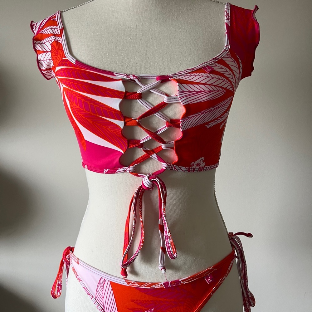 Chynna Doll bikini Side tie scrunch bum. Bottom Large . Top medium . Never worn.